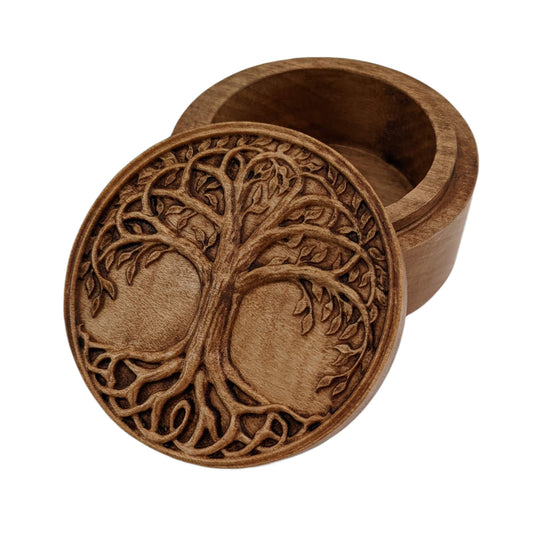 Round wooden box 3D carved with a tree encased in a lined border. Its branches are intertwined with leaves hanging all around and with roots delicately woven together. Made from hard maple wood with a brown stain against a white background.