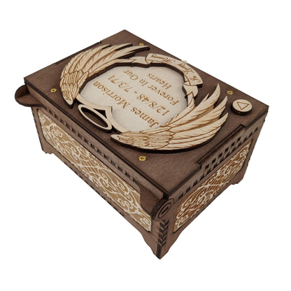 Back view of the angel wings personalized music box that shows decorative filigree panels going around the box.