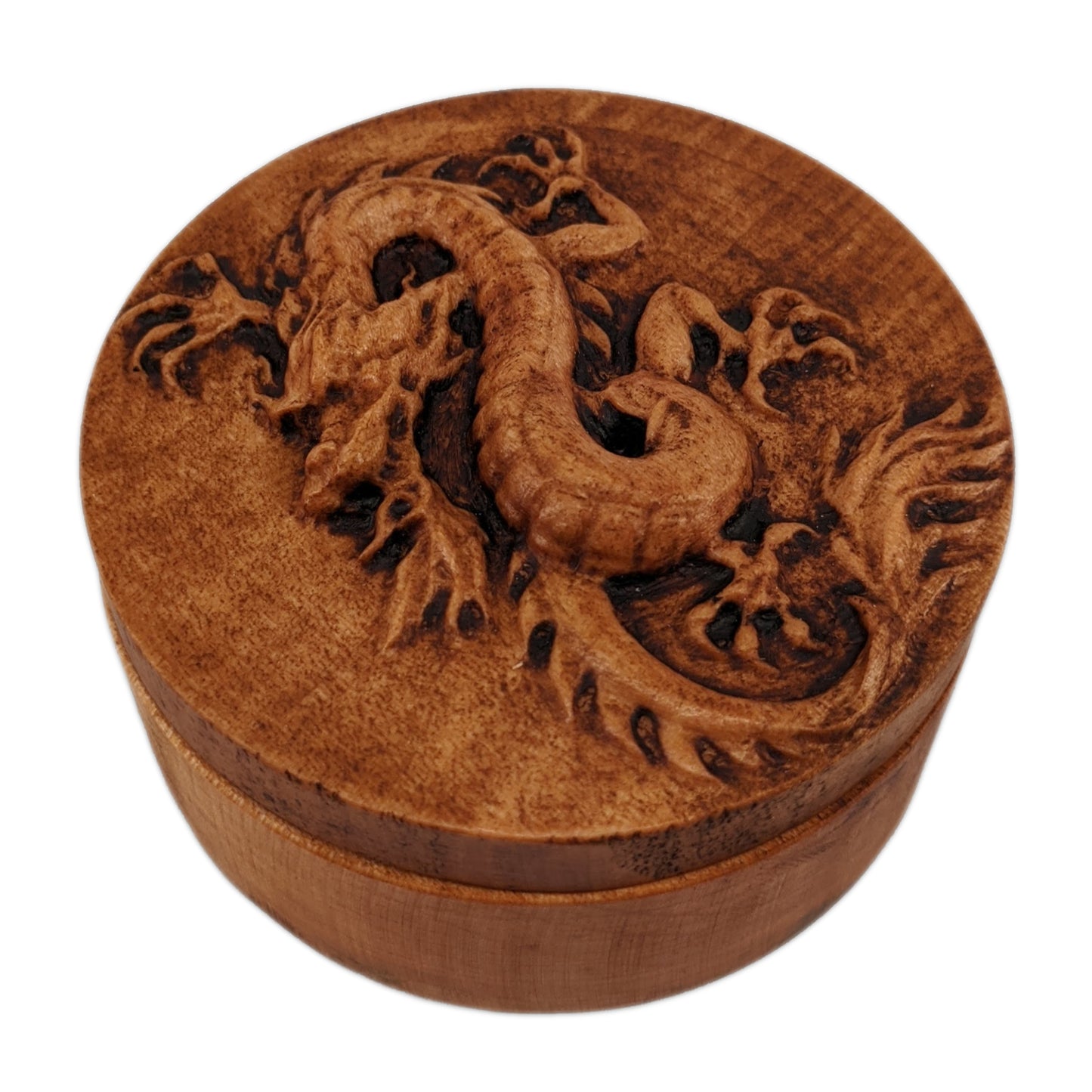 Round wooden box 3D carved with a Chinese dragon coiled around into an upright position. It has an angry bearded face, scaled underbelly, sharp claws, and spines down its back. Made from hard maple wood with a brown stain against a white background.