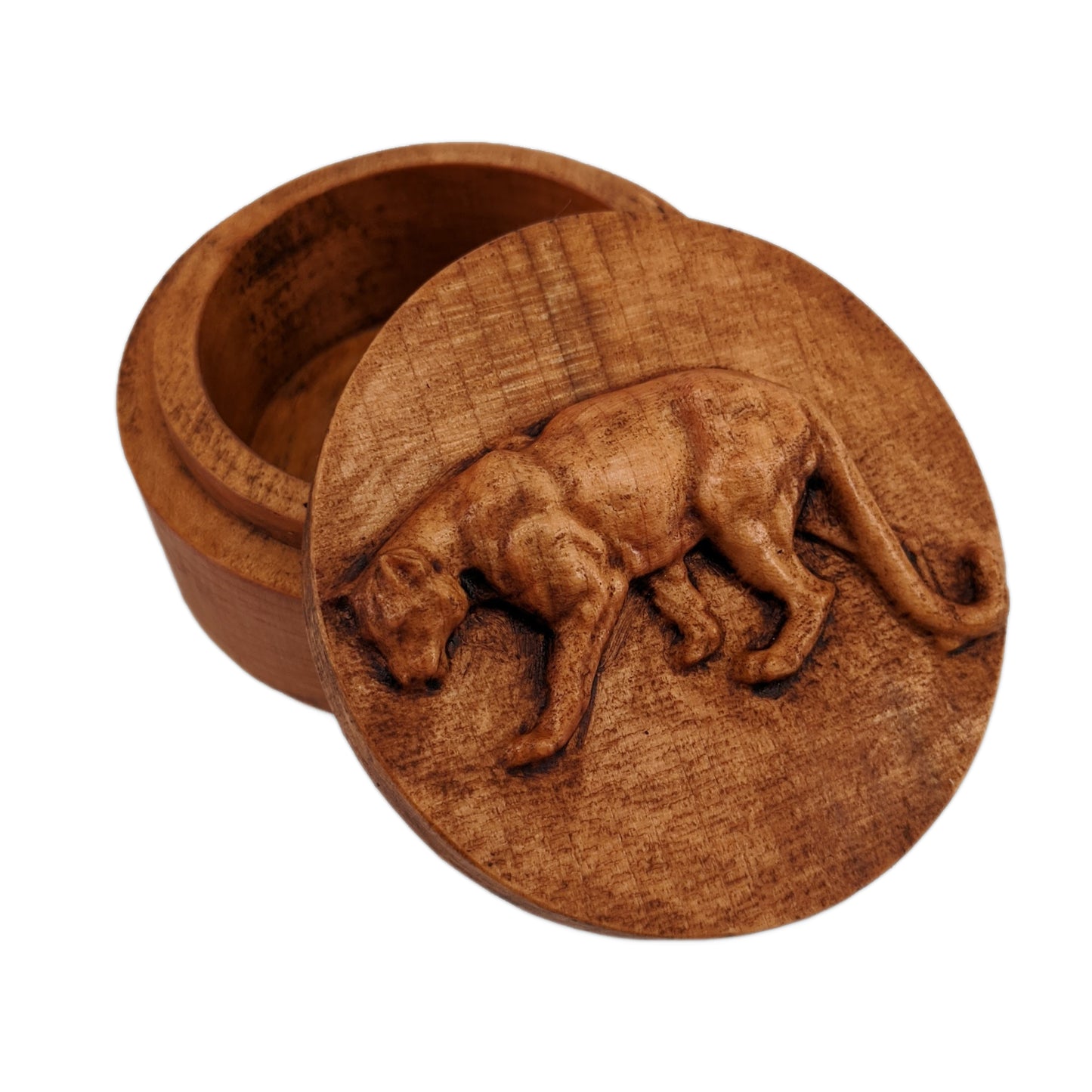 Round wooden box 3D carved with a mountain lion standing broadside to the left. It has a sleek body with its head bent toward the ground and a long tail that hangs to its feet. Made from hard maple wood stained brown against a white background.