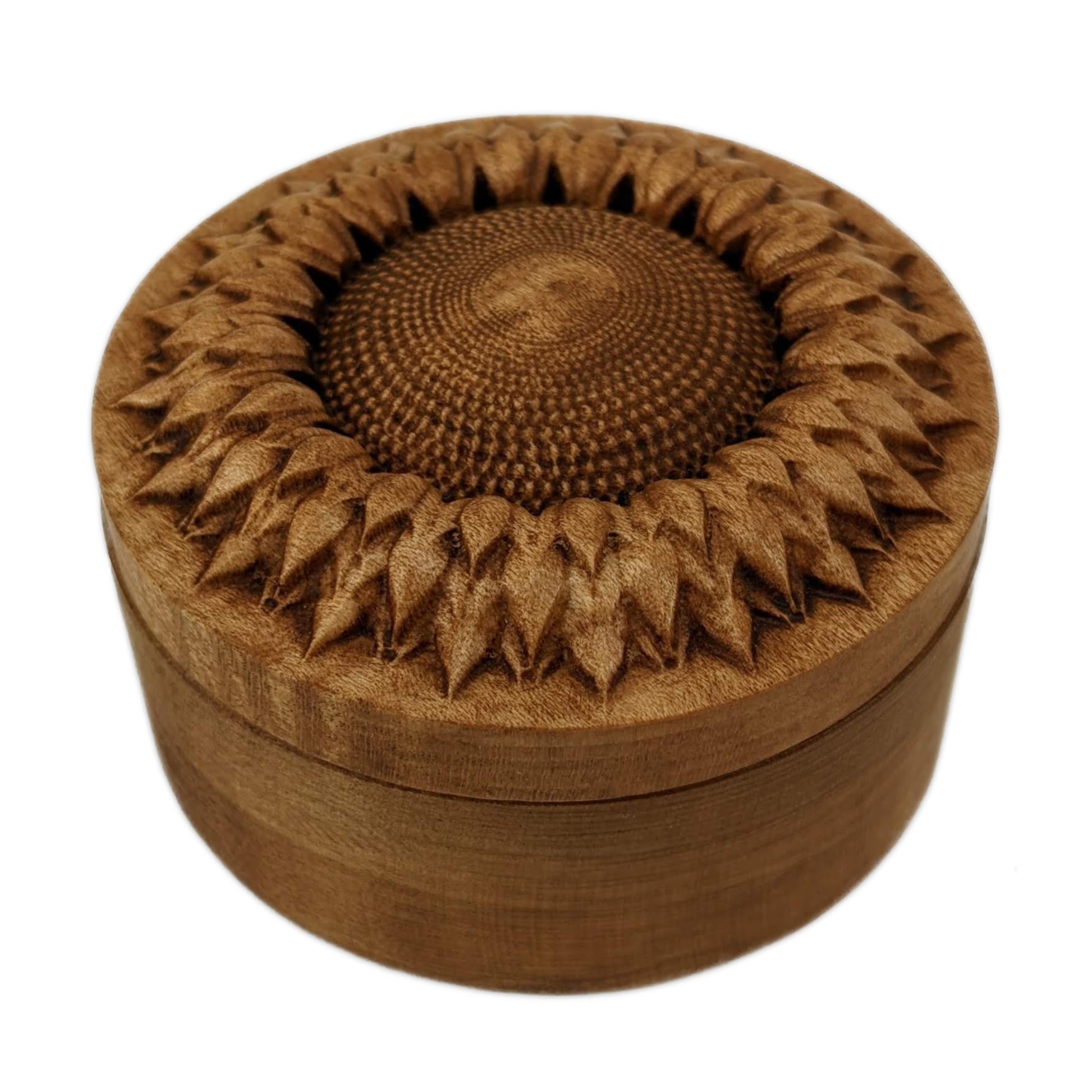 Round wooden box 3D carved with a  top down view of a intricately carved sunflower with dimples covering its center and multiple layered petals circling the center. Made from hard maple wood stained brown against a white background.