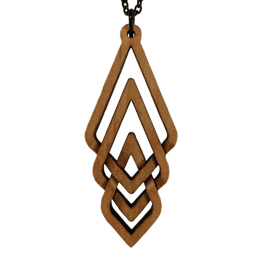 Wooden necklace pendant carved so that three stacked diamond shapes weave into each other. Made from hard maple wood and hanging from a black chain against a white background.